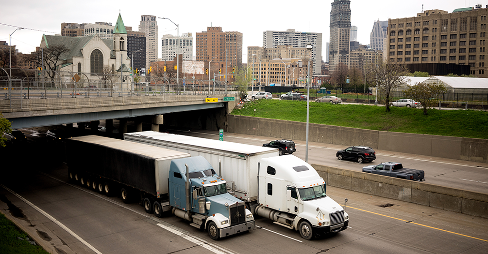 Trucks on a freeway in Detroit.